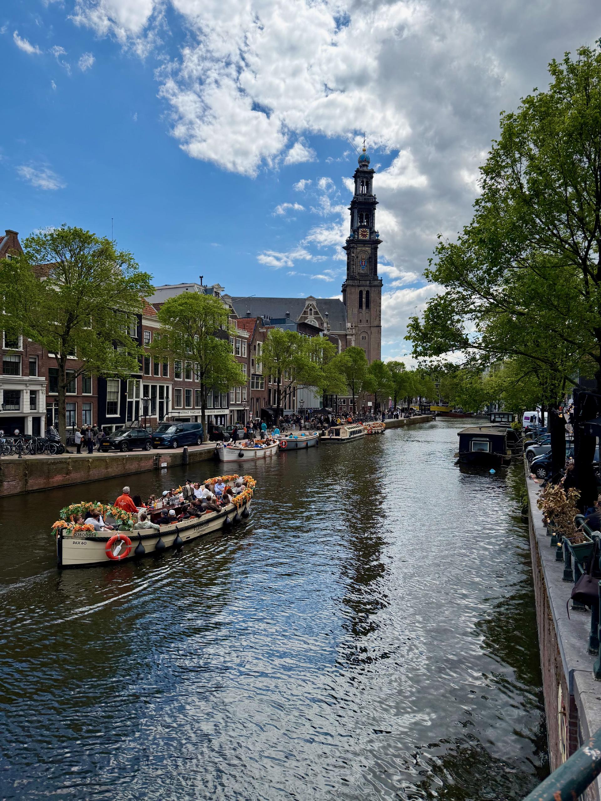 Along the Prinsengracht. The large church is the Westerkerk, and immediately
next door is the Anne Frank House.
